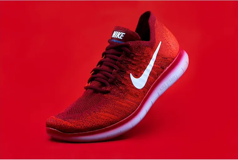 Red sneaker source image prepared for prompt-based AI image editing